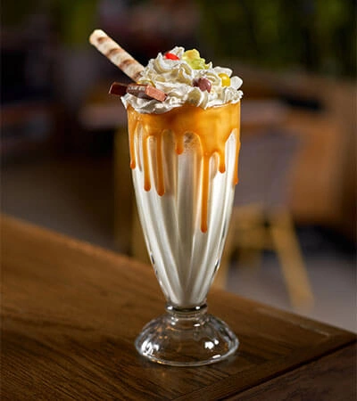 Complete Collagen Plus blended into a caramel milkshake